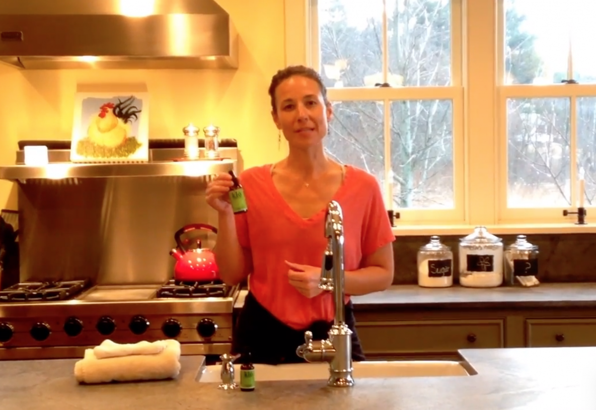 Co-founder Nicole Anagnos demonstrating how to oil cleanse.