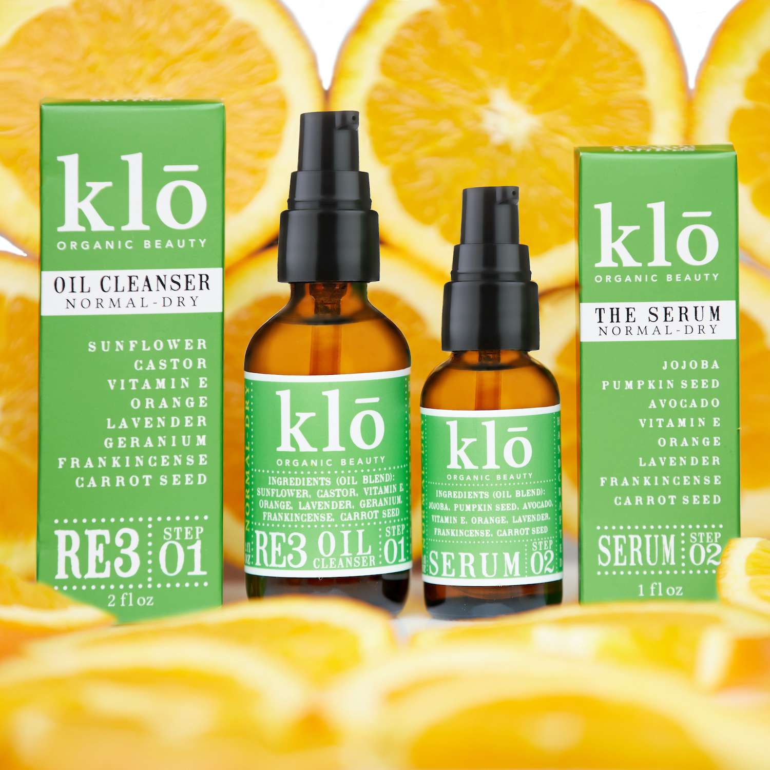 Klo Organic Beauty RE3 oil cleanser and serum for normal-dry skin duo with cut up citrus.